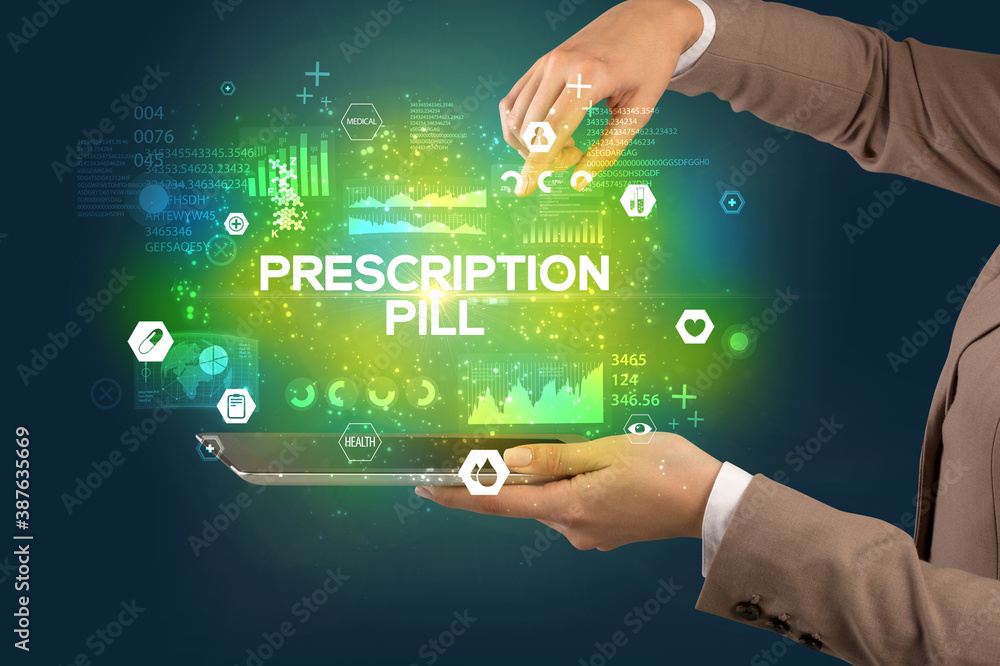 Obraz premium Close-up of a touchscreen with PRESCRIPTION PILL inscription, medical concept