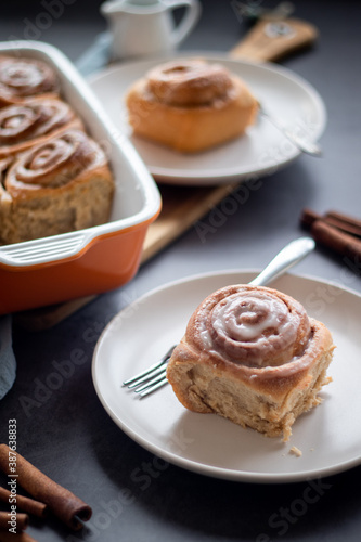 Fresh baked homemade cinnamon rolls with icing, real autumn vibes
