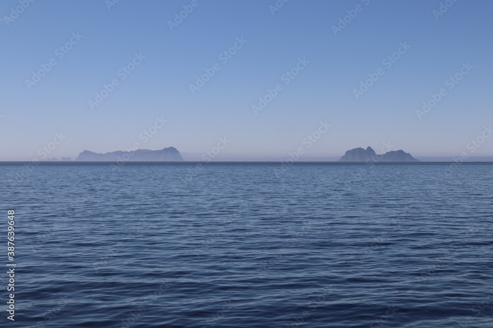 Rocks in the ocean, islands in Norway Rocks in the ocean, islands in Norway