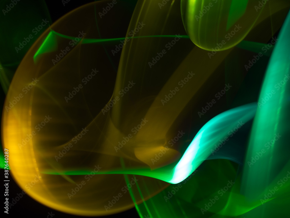 light painting photography, waves of vibrant color against a black background. Long exposure photo of vibrant fairy lights in abstract light painting photography, waves of vibrant color against a black background. Long exposure photo of vibrant fairy lights in abstract