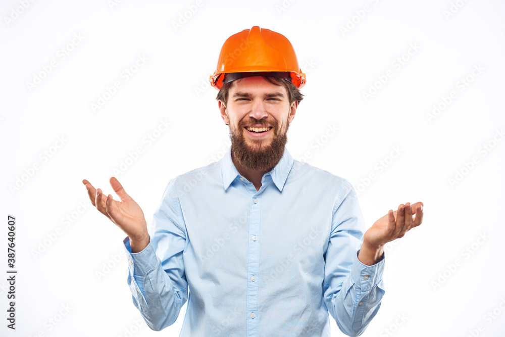 Man in working uniform orange hard hat lifestyle official Man in working uniform orange hard hat lifestyle official