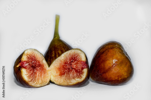 Fresh figs are highlighted on white. Figs fruit. Natural background.