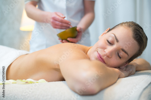 picture of a calm woman waiting for massage