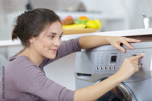 woman doing a washing machine