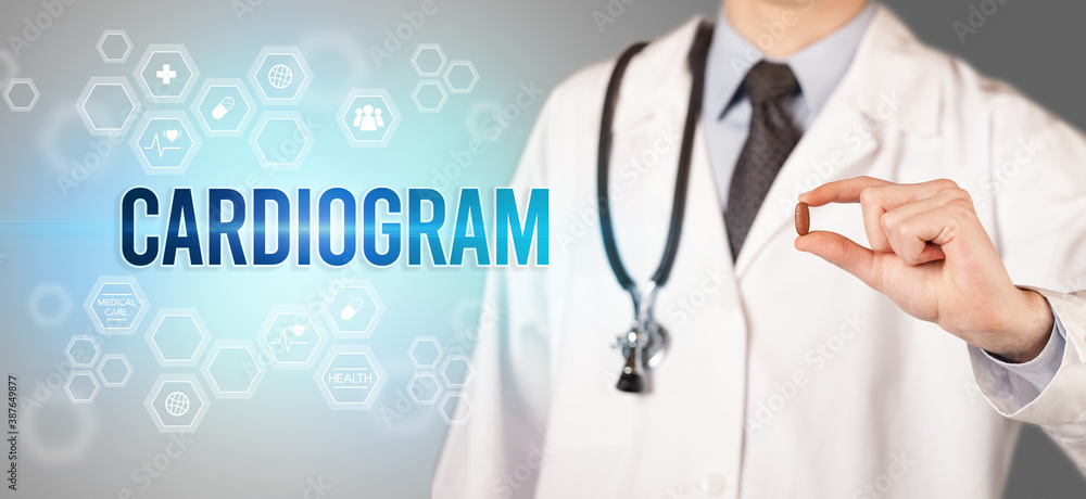 Close-up of a doctor giving you a pill with CARDIOGRAM inscription, medical concept Close-up of a doctor giving you a pill with CARDIOGRAM inscription, medical concept