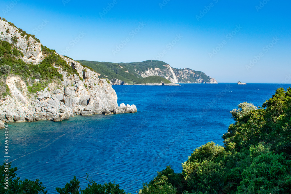 A view of the Ionian Sea and surrounding limestone cliffs in Palaiokastritsa, Corfu, Greece
