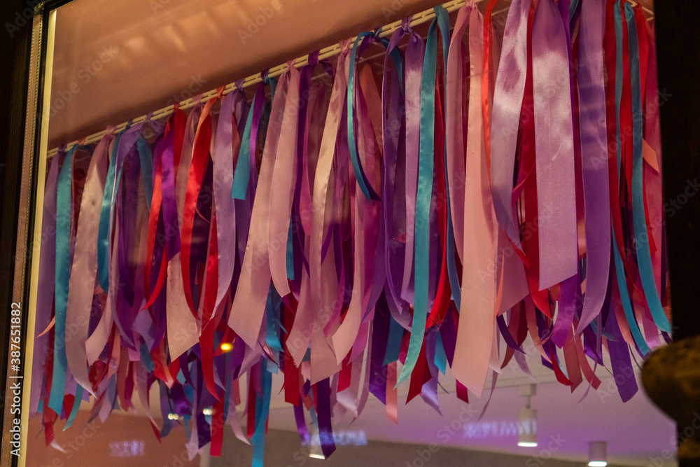 colored ribbons on the ceiling of the party birthday celebration  festive