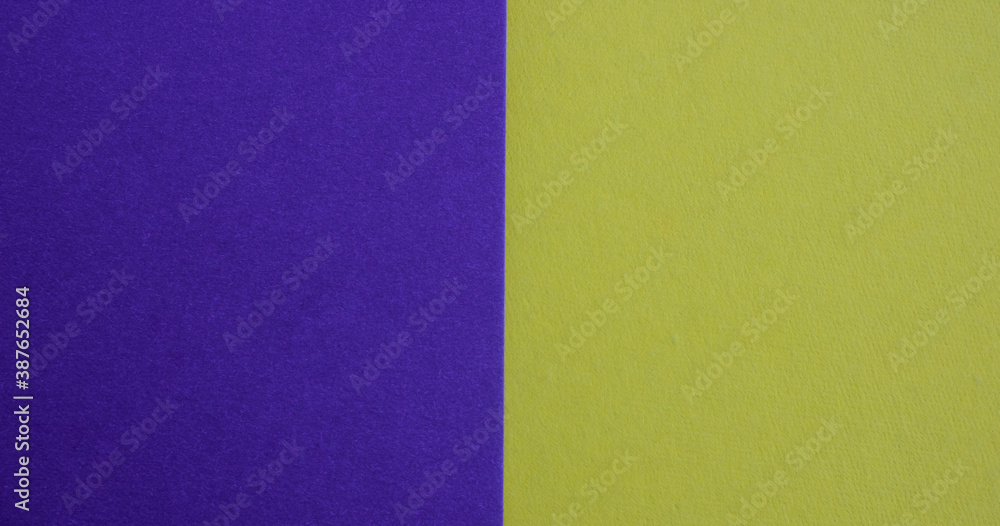 Purple-yellow background of matte suede, close-up. Velvety texture Purple-yellow background of matte suede, close-up. Velvety texture
