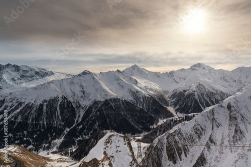 Panorama of alpine mountains in the morning at the Ischgl ski resort, Austria..
