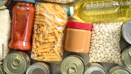 Food donations. Food with long shelf life rotating, top view