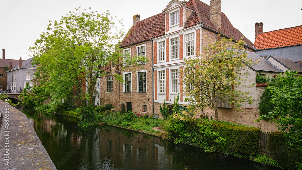 Beautiful View Of Authentic Houses Above The Canal In The Belgian City Of Bruges. Beautiful View Of Authentic Houses Above The Canal In The Belgian City Of Bruges.
