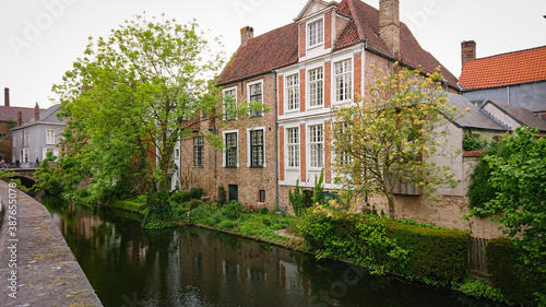 Beautiful View Of Authentic Houses Above The Canal In The Belgian City Of Bruges.