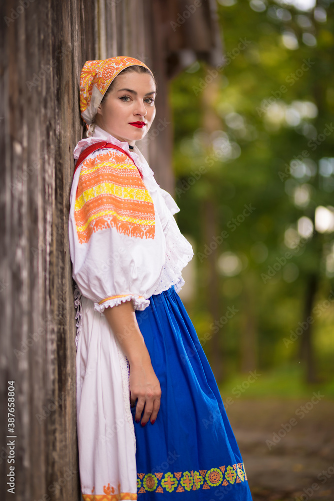 Beautiful woman wearing traditional Eastern Europe folk costumes. 
Slovak folklore.