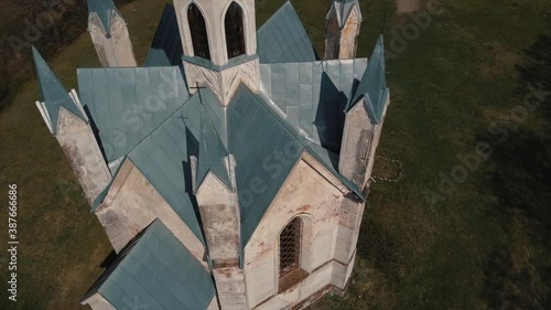 Breathtaking top view of gothic church in the forest