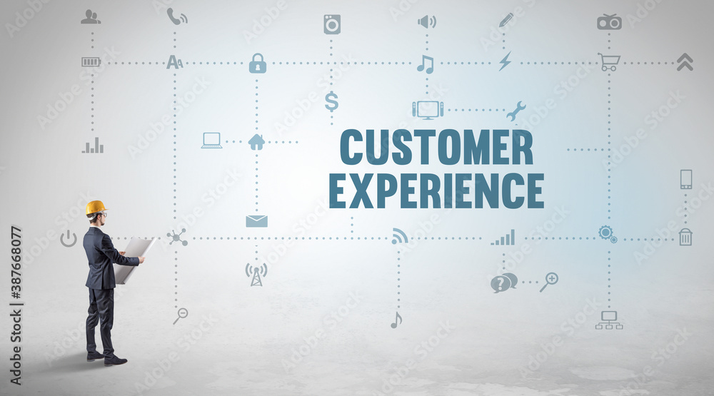 Engineer working on a new social media platform with CUSTOMER EXPERIENCE inscription concept Engineer working on a new social media platform with CUSTOMER EXPERIENCE inscription concept