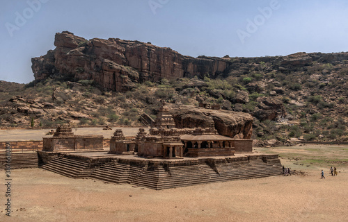 Badami, a small town in central Karnataka, is famous for its four rocky cave temples carved from a reddish sandstone in the mountain