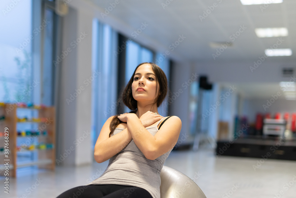 Woman working out in a gym
