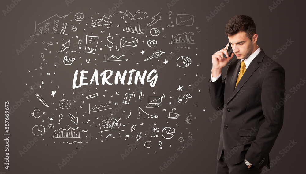 Businessman thinking with LEARNING inscription, business education concept