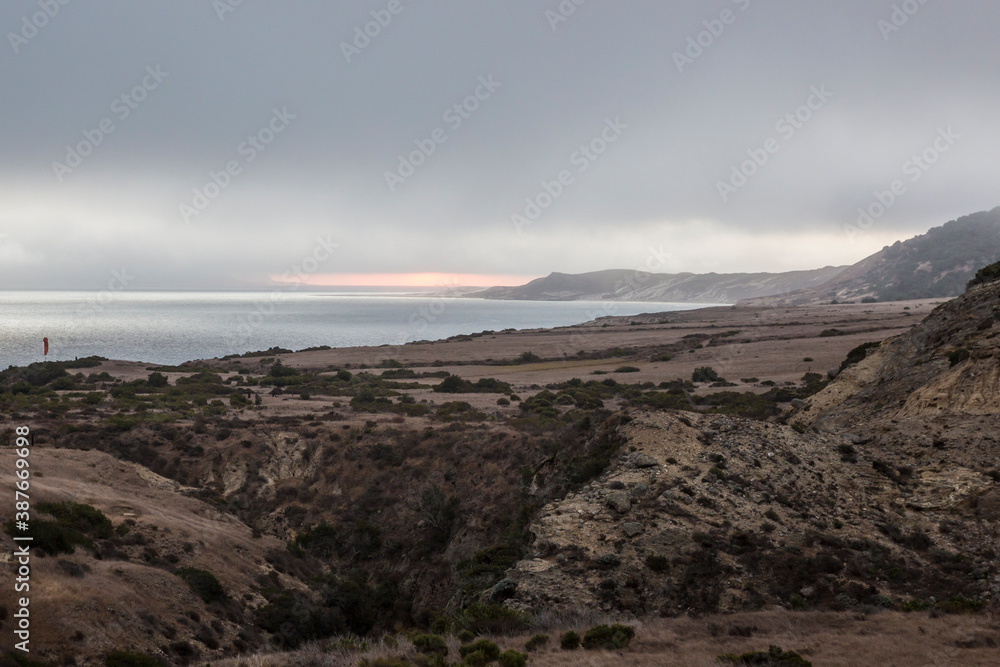 Landscape view of the sunset from Santa Rosa Island looking out at Santa Cruz Island in Channel Islands National Park (California).