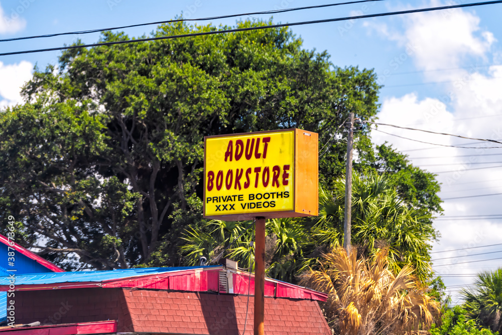 Tampa, USA April 27, 2018 Florida city with building exterior sign for Adult Bookstore with