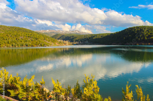 A beautiful and generic view of lake and mountains, lake and mountains with a reflection