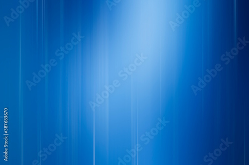 Abstract blue background with white spot and white blurred stripes