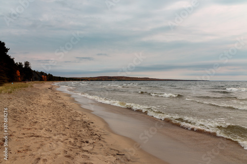 Fototapeta Naklejka Na Ścianę i Meble -  Sandy beach and waves lake Superior Ontario Canada 