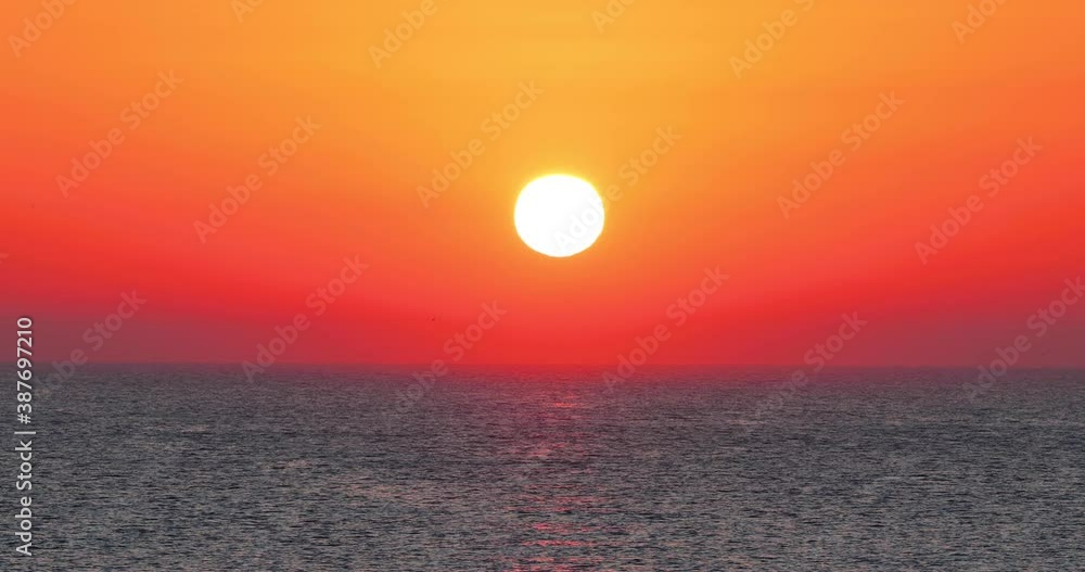 Rising sun over the sea horizon Rising sun over the sea horizon