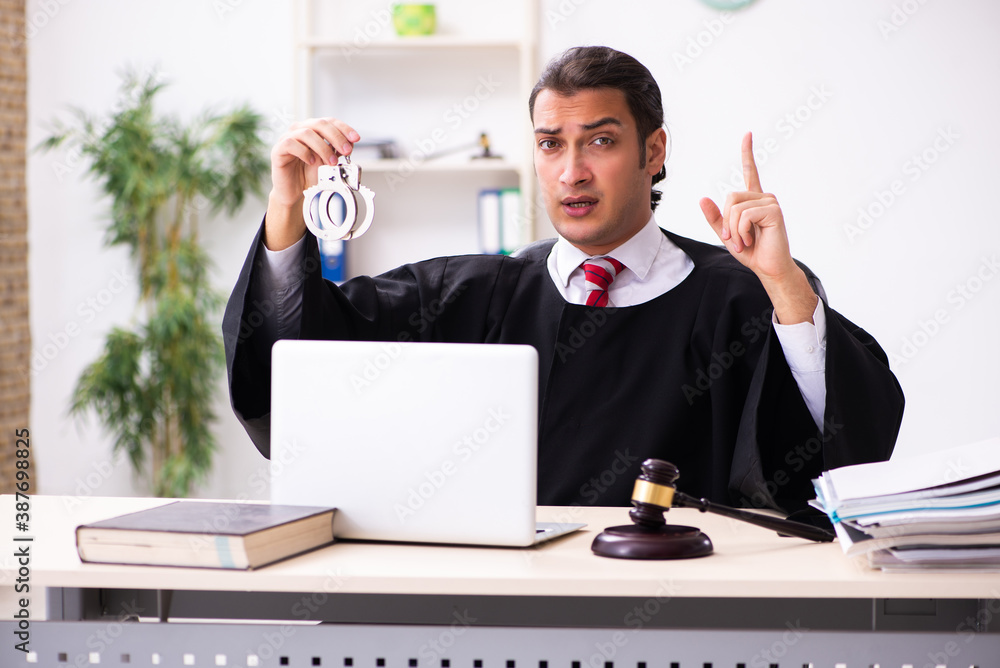 Young male lawyer working in the courthouse Young male lawyer working in the courthouse