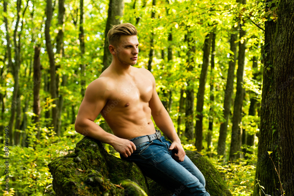 Sexy male bare torso outdoor. Handsome masculine man. Muscular guy with