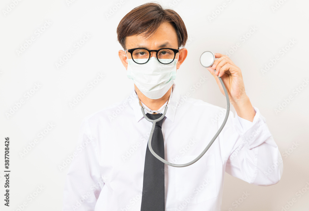 Asian doctor diagnose with stethoscope on white background. Asian doctor diagnose with stethoscope on white background.