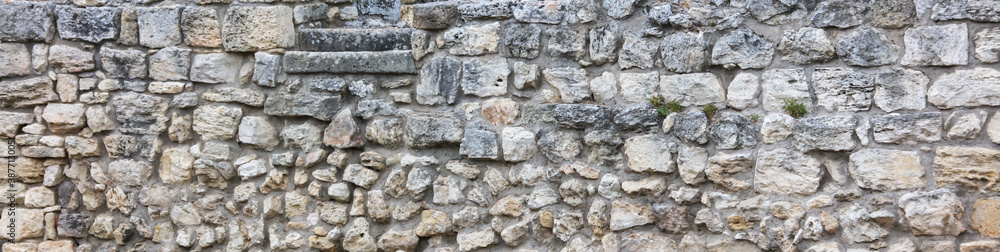 Stones in the wall of the house as an abstract background. Stones in the wall of the house as an abstract background.