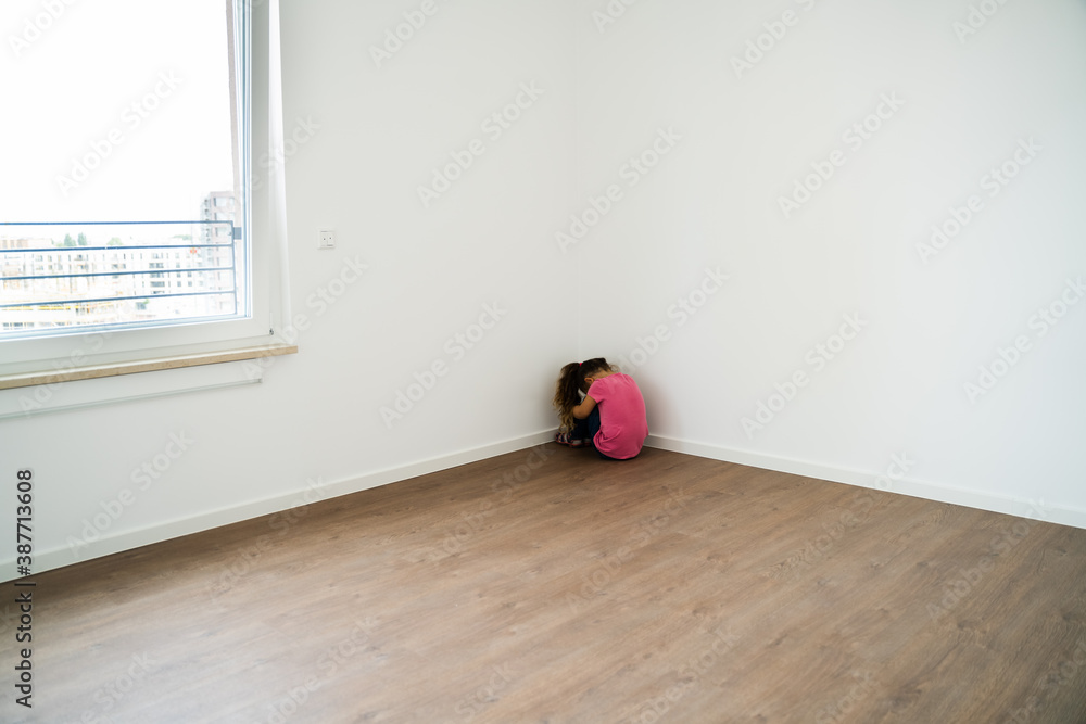 Afraid And Ashamed Child Kid Sitting In Corner Stock Photo | Adobe Stock