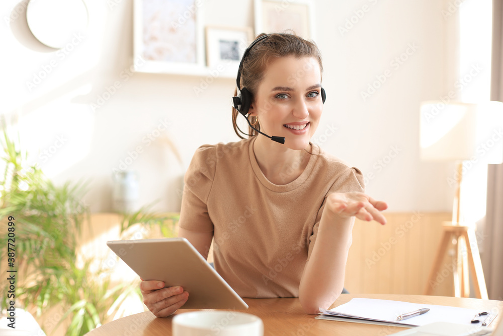 Freelance business women using tablet working call video conference with customer in workplace at home. Freelance business women using tablet working call video conference with customer in workplace at home.