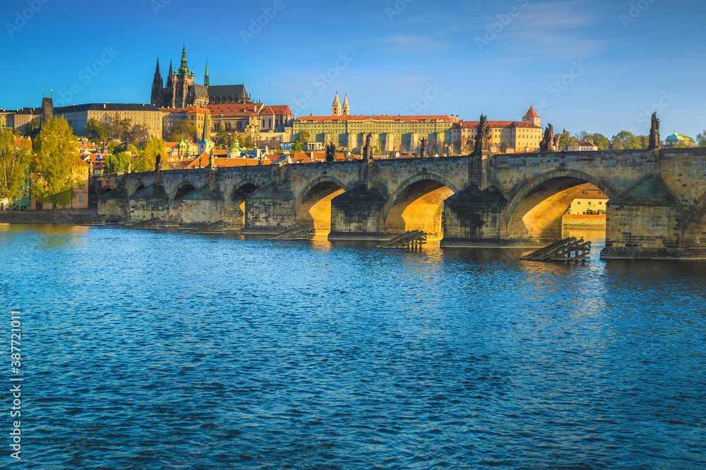 Beautiful Prague cityscape with Charles bridge over the Vltava river