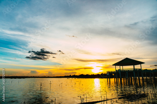 Sunset or evening time at water lake of public park of Bueng See Fai  Phichit Province  Thailand.