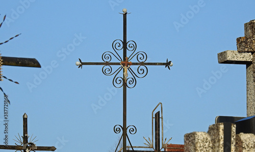 metal tombstone crosses from the old cemetery in the village of Niewodnica in Podlasie, Poland, November 2019