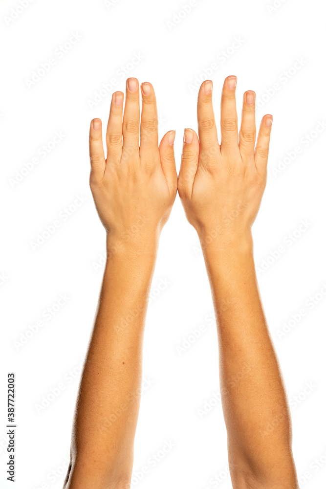 Arms up and open hands, isolated on white. Arms up and open hands, isolated on white.