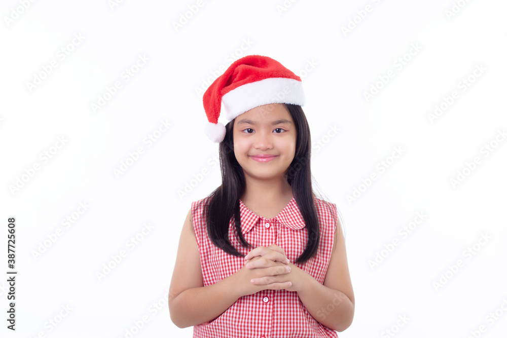 Happy Little Asian girl wearing Santa Claus hat Happy Little Asian girl wearing Santa Claus hat