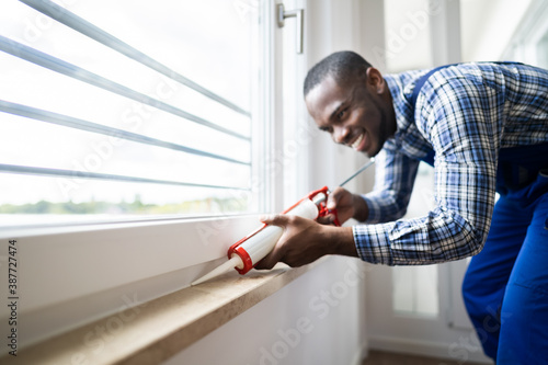 Caulk Sealant Application. Silicone Window Seal