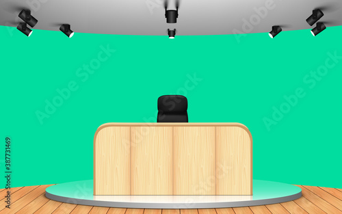 wooden table in news studio room with the green background