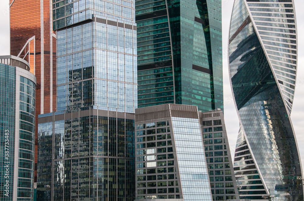 Skyscraper towers close up, reflections Skyscraper towers close up, reflections