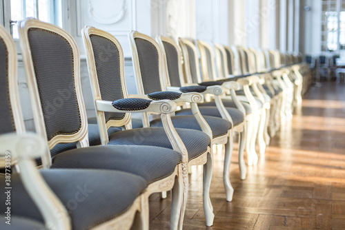 Antique style chairs row, indoor interior