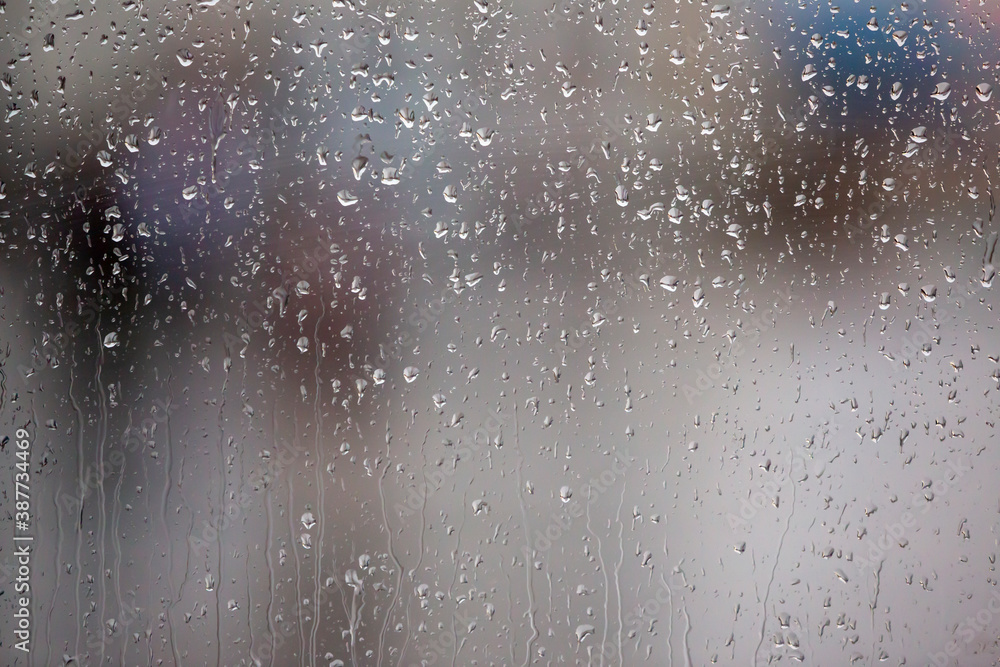 close up rain drops on glass.