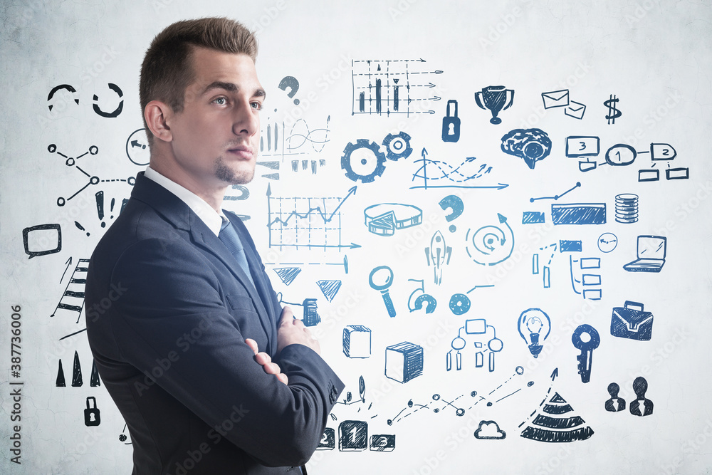 Serious young businessman and business sketch Serious young businessman and business sketch