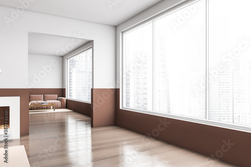White and brown bedroom corner with doorway