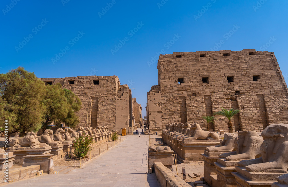 Entrance to the Karnak temple with its beautiful corridor of ram sculptures, the great sanctuary of Amun. Egypt