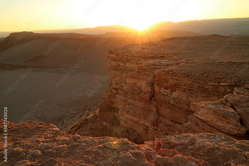 The Sun Setting on the Mountain Ranges of Valle de la Luna or Moon Valley in Atacama Desert, San Pedro de Atacama, Northern Chile