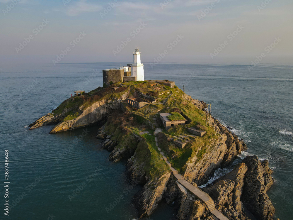 The Mumbles Light House, located in Gower near Swansea is located on its own island in the ocean with stunning coastal views. 