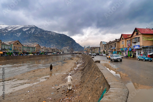 KABUL,AFGHANISTAN/MARCH 3, 2009: The Kabul river embankment in the city center photo